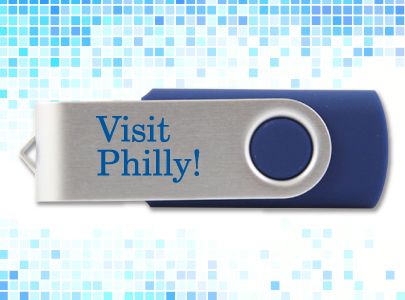Blue and Silver Swivel USB Flash Drive with a capacity of 1gb, 2gb, or 4gb imprinted with Visit Philly logo